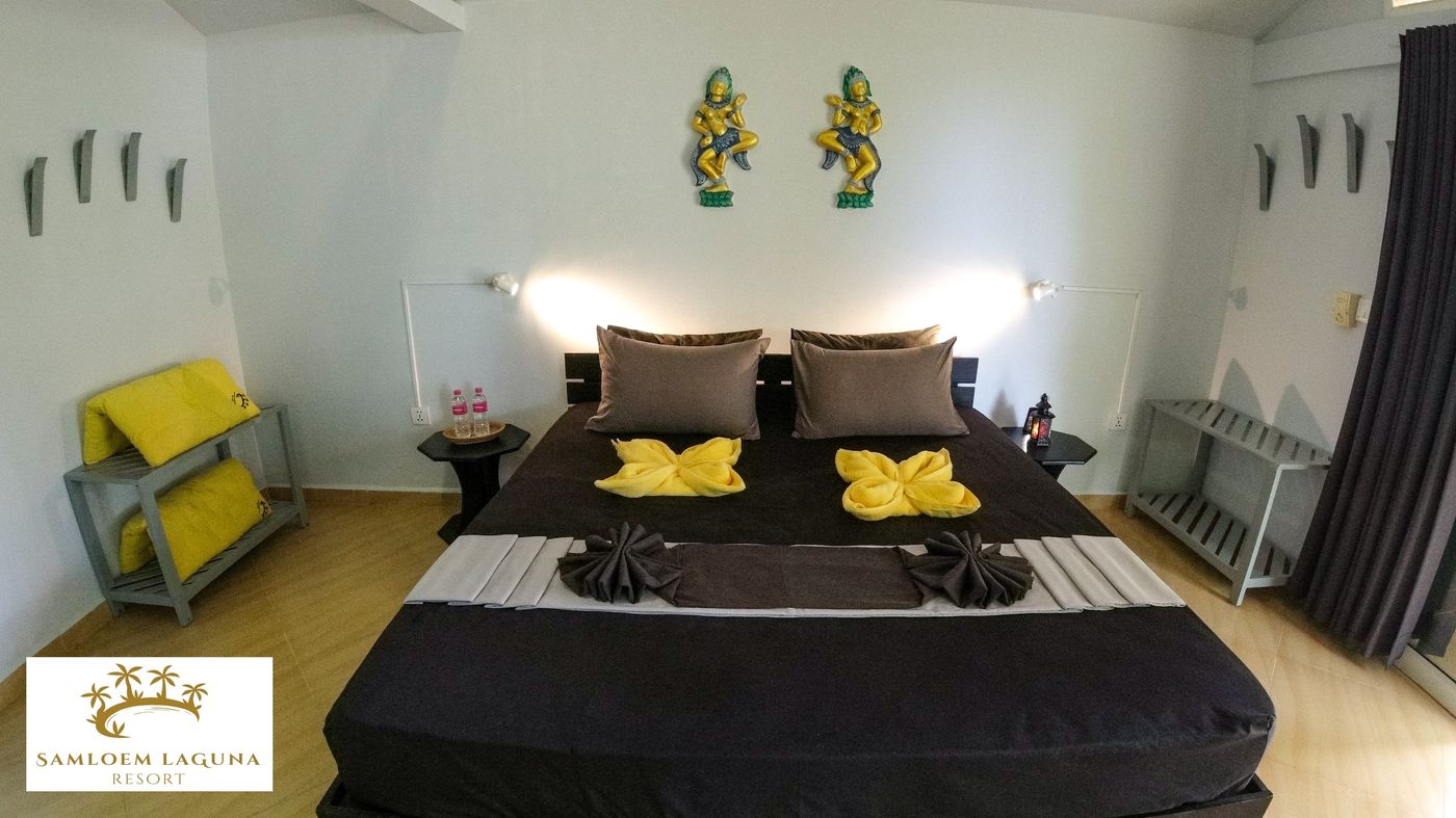 Double room with large bed at Samloem Laguna Resort